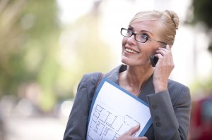 Female Real Estate Agent talking on phone